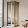 Contemporary Pattern 10 Oak Bifold Internal Door - Clear Glass