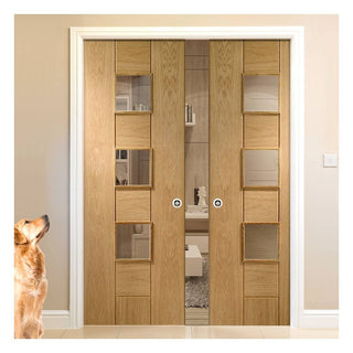 Image: Messina Oak Double Evokit Pocket Doors - Clear Glass - Prefinished